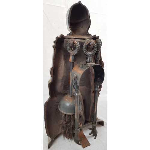 741 - A FIRESIDE SET TO INCLUDE A BRUSH, TONGS AND A POKER HOUSED IN A SUIT OF ARMOUR.
36cms IN HEIGHT.