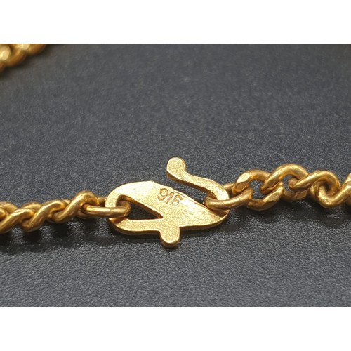 189 - A heavy 22 carat yellow gold chain with a personalised pendant. Chain length: 56cm. total weight: 42... 