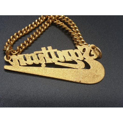 189 - A heavy 22 carat yellow gold chain with a personalised pendant. Chain length: 56cm. total weight: 42... 