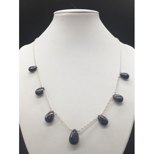 375 - A collection of cabochon Blue Sapphire Gemstone Necklace with matching sapphire ring SIZE O