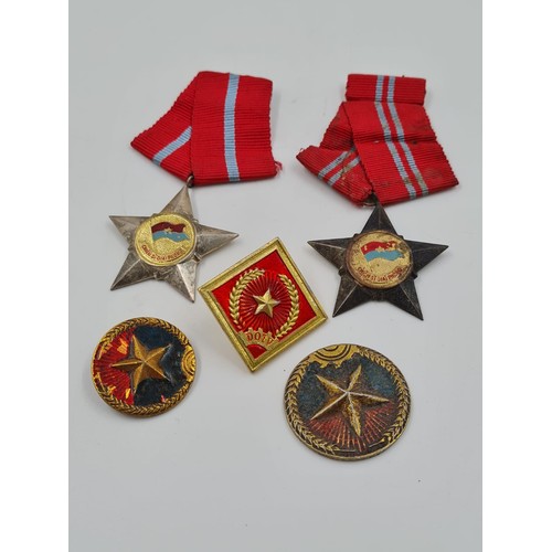 235 - Vietnam War Era Viet Cong Medals and Badges.