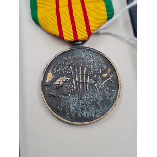 284 - US Vietnam War Service Medal in original box.