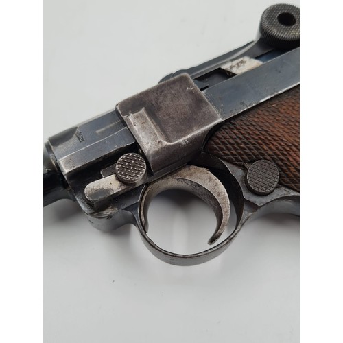 7 - 1938 Dated Deactivated German Luger with certificate.