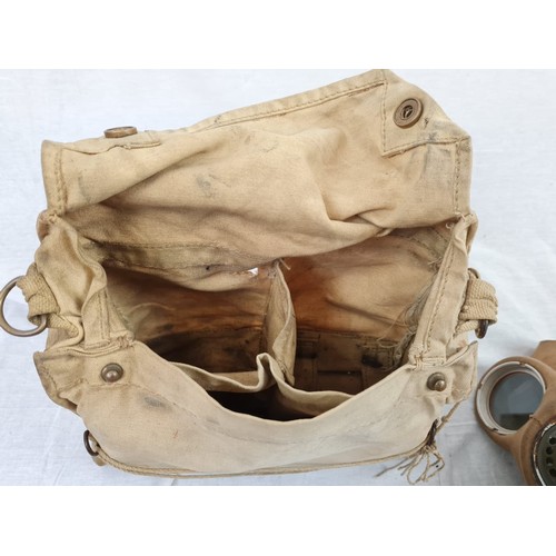 188 - 1939 Dated British Army Gas Mask in desert colour and case. Includes de-misting kit and emergency ey... 