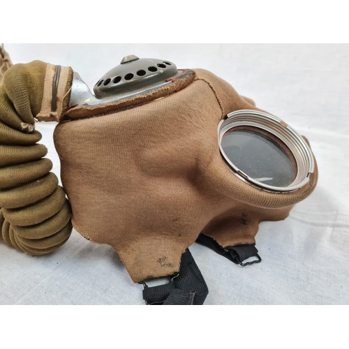 188 - 1939 Dated British Army Gas Mask in desert colour and case. Includes de-misting kit and emergency ey... 