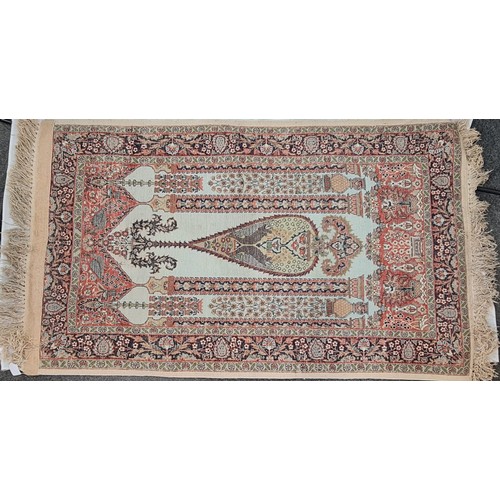 165 - EARLY PERSIAN HAND KNOTTED RUG OR PRAYER MAT DECORATED WITH FLOWERS AND COLUMNS
153CMS X 90CMS