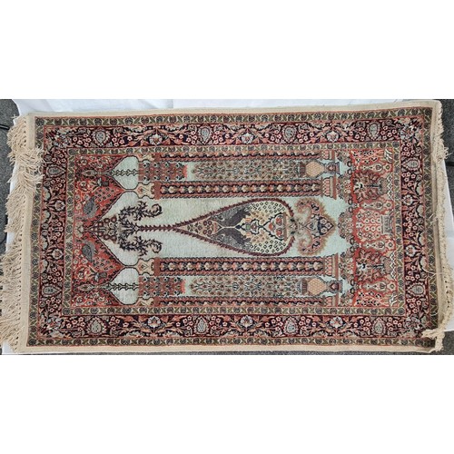 165 - EARLY PERSIAN HAND KNOTTED RUG OR PRAYER MAT DECORATED WITH FLOWERS AND COLUMNS
153CMS X 90CMS