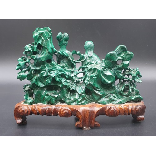 275 - CHINESE HAND CARVED MALACHITE WITH FIGURES ,FLOWERS AND ROCKERY ON ORIGINAL ROSEWOOD BASE  15.5CMS X... 