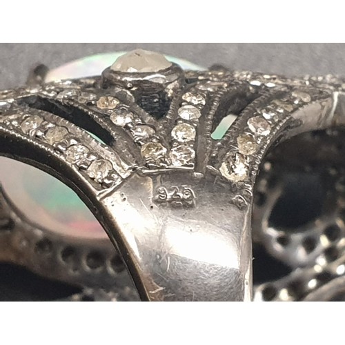 150 - AN UNUSUAL SILVER ART DECO STYLE DRESS RING ADORNED WITH DIAMONDS(APPROX 3CT) WITH A  LARGE 6 CT aus... 
