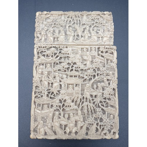 265 - Chinese 19th century deep hand carved ivory card case,
relief with garden figures and houses A/F