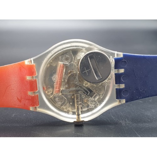 418 - A Pair of 1980s Swatch Watches. Never worn, In Cases ( As Found)