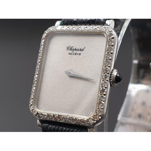 144 - Chopard Ladies WRISTWATCH with Diamond Bezel, manual movement.   Leather Strap.  20mm