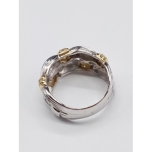 223 - 18ct White Gold RING trimmed with Yellow Gold and Diamonds. 8.6g   Size: L