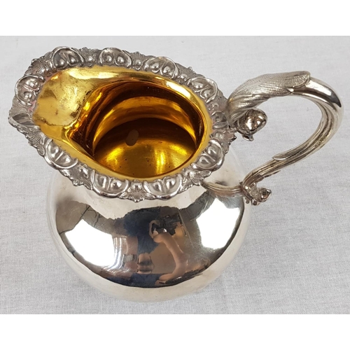 606 - An Antique Silver Creamer. Rich Internal Gilding, with beautiful decoration on the pedestal base, ha... 