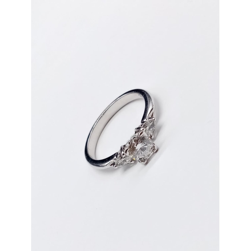 529 - 14ct White Gold Diamond Solitaire RING with approx 0.75ct Diamond Centre and 2 pear-shaped diamonds ... 