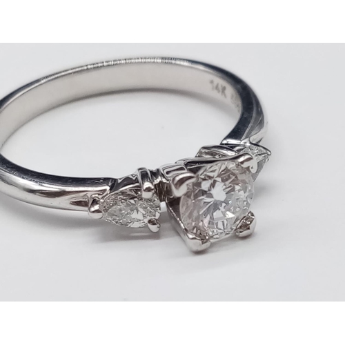 529 - 14ct White Gold Diamond Solitaire RING with approx 0.75ct Diamond Centre and 2 pear-shaped diamonds ... 