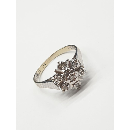 833 - 9ct Gold and Diamond RING in flower design.  2.9g  Size: O