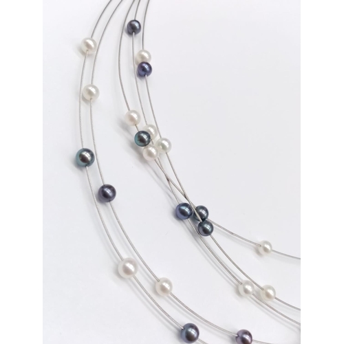 845 - Elegant and delicate Pearl NECKLACE with various shades of pearls, set in 18ct white Gold.   9g    4... 