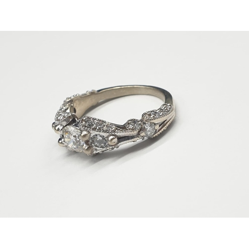 527 - Platinum Hand Crafted Diamond RING with approx 0.5 ct diamond centre and further diamond setting on ... 