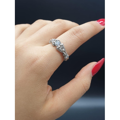 527 - Platinum Hand Crafted Diamond RING with approx 0.5 ct diamond centre and further diamond setting on ... 