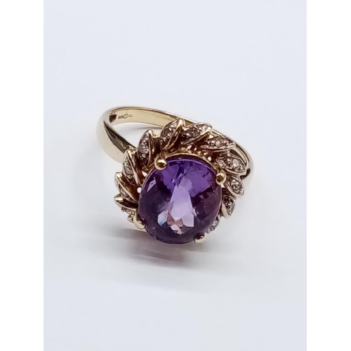 535 - 9ct Yellow Gold RING with large Amethyst centre.   3.6g  Size:  N 1/2