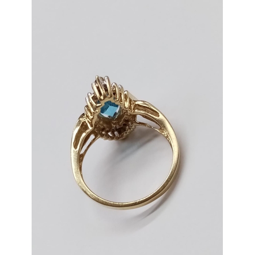 852 - 10K Topaz and diamond ring. 4.15g and Size O