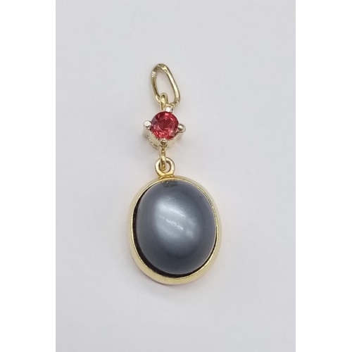 884 - Yellow Metal Ruby and Moonstone PENDANT.  3.37g  2cm drop