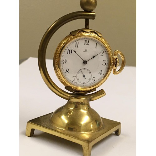 19 - Vintage gold plate omega pocket watch & stand working but sold with no guarantees
