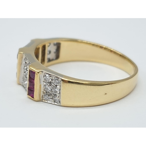 598 - 18ct Gold diamond and ruby ring. Weighs 5.1g and size Q.