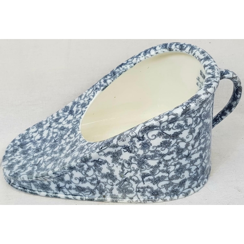 169 - A blue and white porcelain NEW SLIPPER BED PAN by  Maw Son & Thomson  London. This was the luxury mo... 