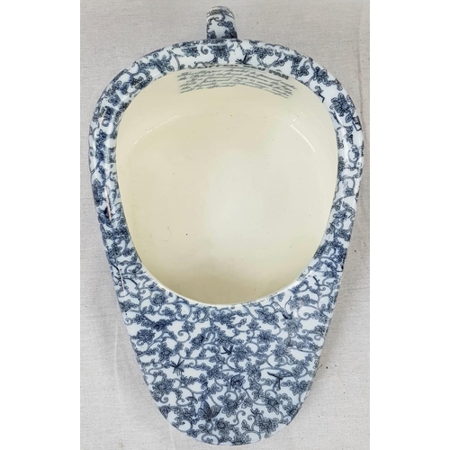 169 - A blue and white porcelain NEW SLIPPER BED PAN by  Maw Son & Thomson  London. This was the luxury mo... 