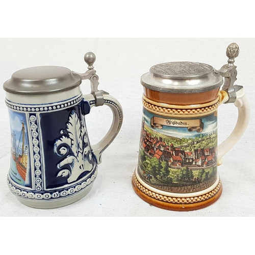 924 - A Pair of Decorated German Ceramic Beer Steins. 15cm tall.