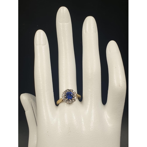 12 - 18ct yellow gold sapphire and diamond cluster ring, weight 3.79g and size N
