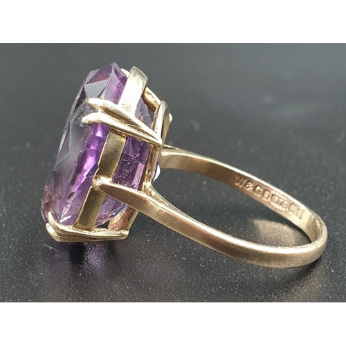 319 - 9ct yellow gold large amethyst ring, weight 6g and size P1/2