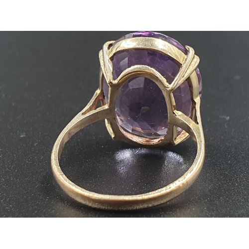 319 - 9ct yellow gold large amethyst ring, weight 6g and size P1/2