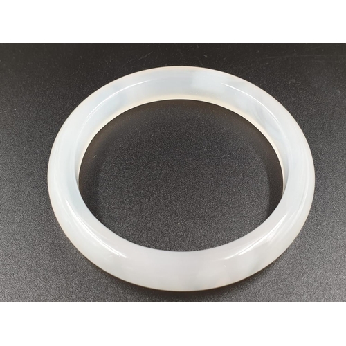 497 - White colour jade bangle weight 46g and 6.5cm inner diameter