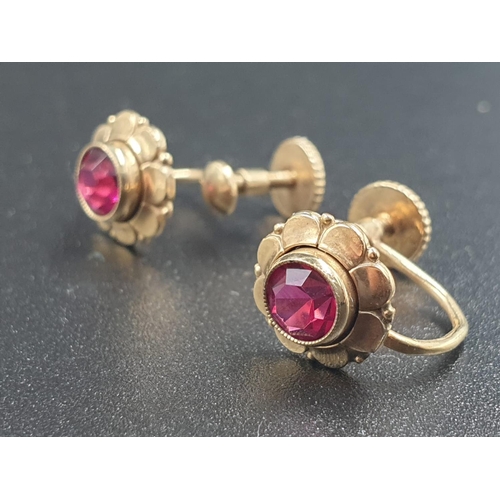 593 - Pair of rolled gold earrings