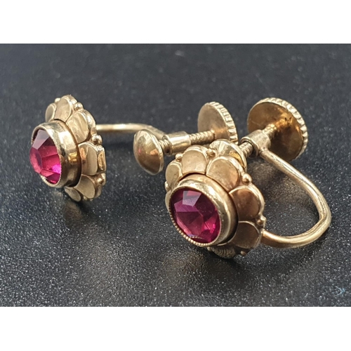 593 - Pair of rolled gold earrings