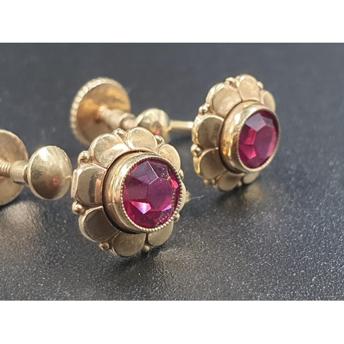 593 - Pair of rolled gold earrings