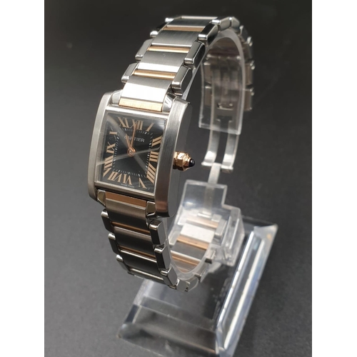 118 - A CARTIER TANK STYLE WATCH WITH BI-COLOURED STAINLESS STEEL STRAP, BLACK FACE WITH ROSE GOLD COLOURE... 
