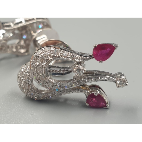 136 - A PAIR OF 18CT WHITE GOLD EARRINGS WITH RUBY AND DIAMONDS.
11.5gms