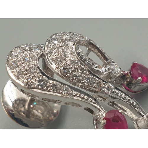 136 - A PAIR OF 18CT WHITE GOLD EARRINGS WITH RUBY AND DIAMONDS.
11.5gms