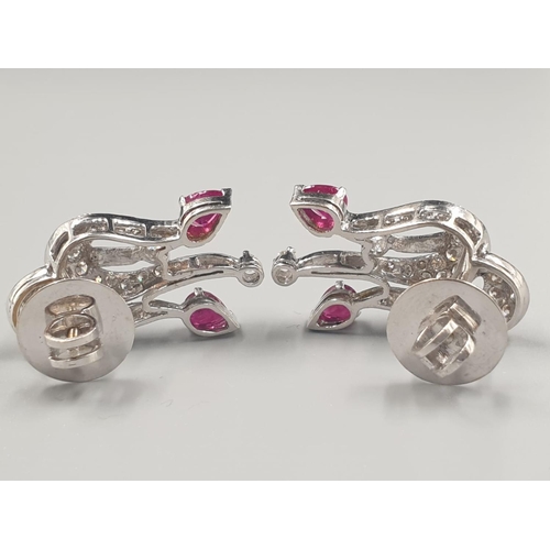 136 - A PAIR OF 18CT WHITE GOLD EARRINGS WITH RUBY AND DIAMONDS.
11.5gms