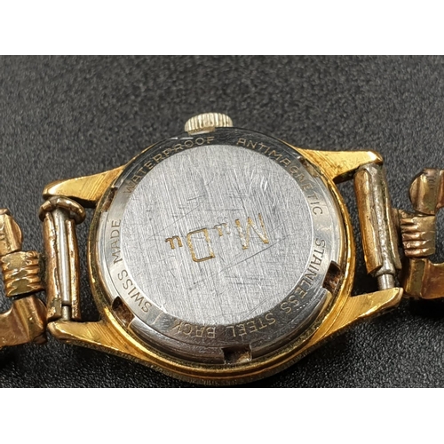 494 - MUDU GP 25 JEWELLED DOUBLEMATIC MOVEMENT WATCH, WORKING BUT TIME KEEPING SLIGHTLY OFF