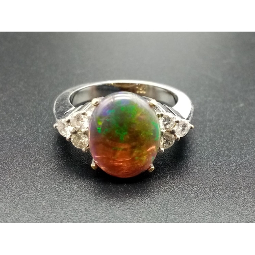 178 - 18ct white gold opal ring, 10x12mm opal centre and diamonds on shoulders, weight 10g and size N1/2