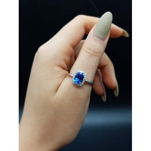 325 - 14ct white gold tanzanite ring, weight 3.37g and size R