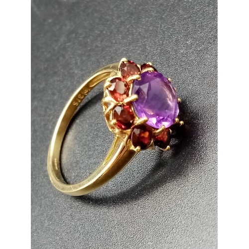 328 - 9ct yellow gold garnet and amethyst ring, weight 2.88g and size P