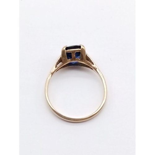 335 - Yellow gold sapphire solitaire ring, weight 2.1g and size N