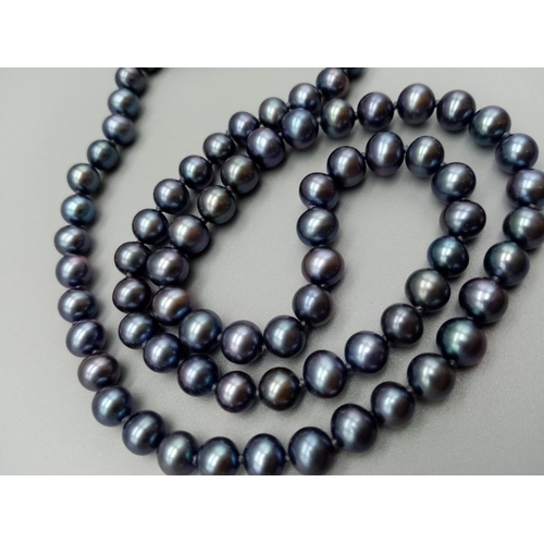 396 - Black pearl necklace silver clasp, weight 19g and 46cm long approx