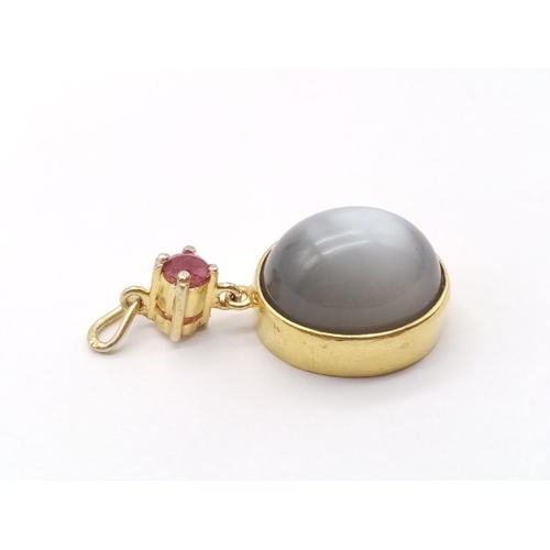 415 - Moonstone and ruby gold pendant, weight 4.4g 2.5cm drop